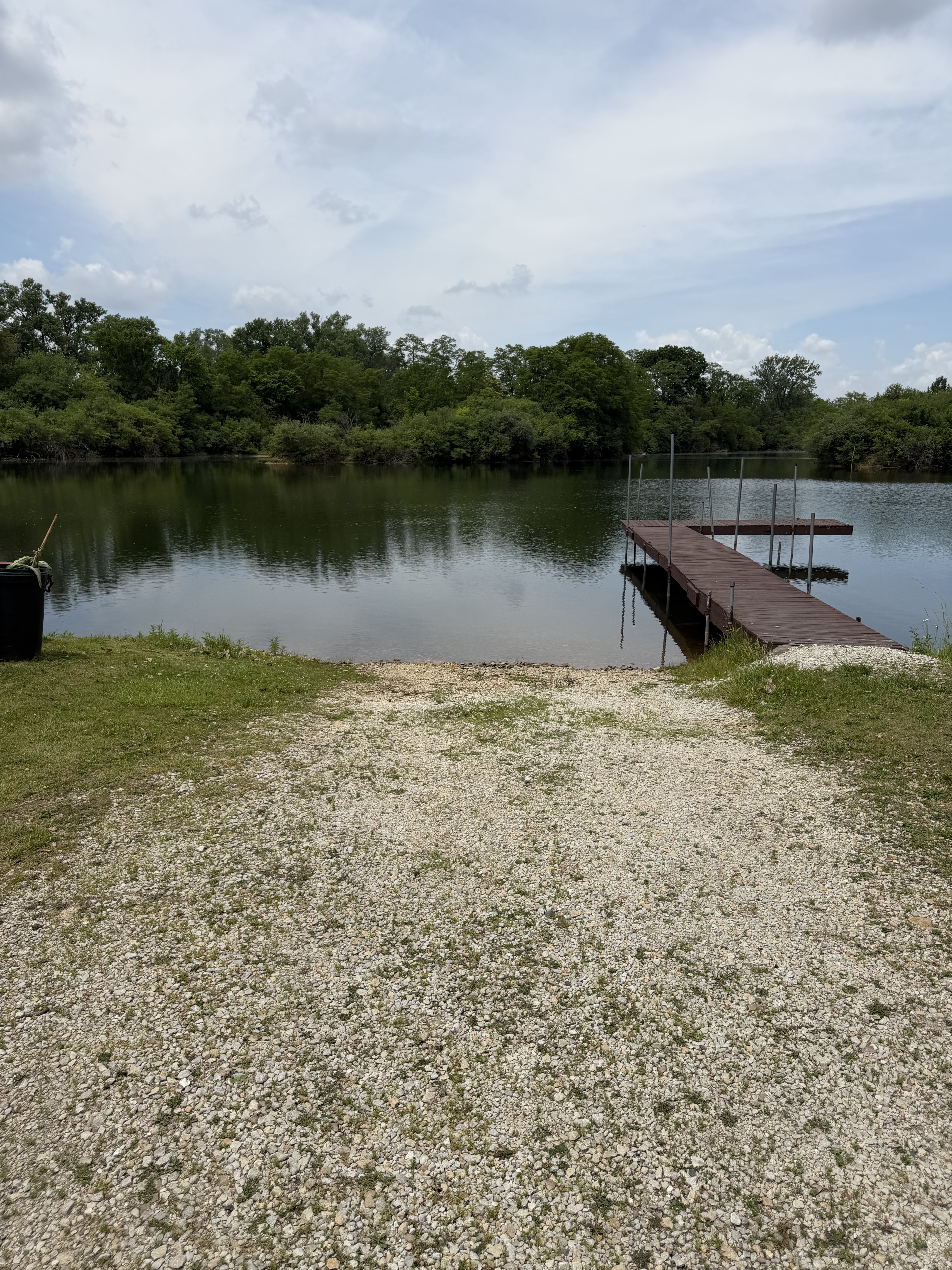 Gravel boat launch and dock on Deer Creek Lake at Deer Creek Recreation Club in Plainfield Illinois