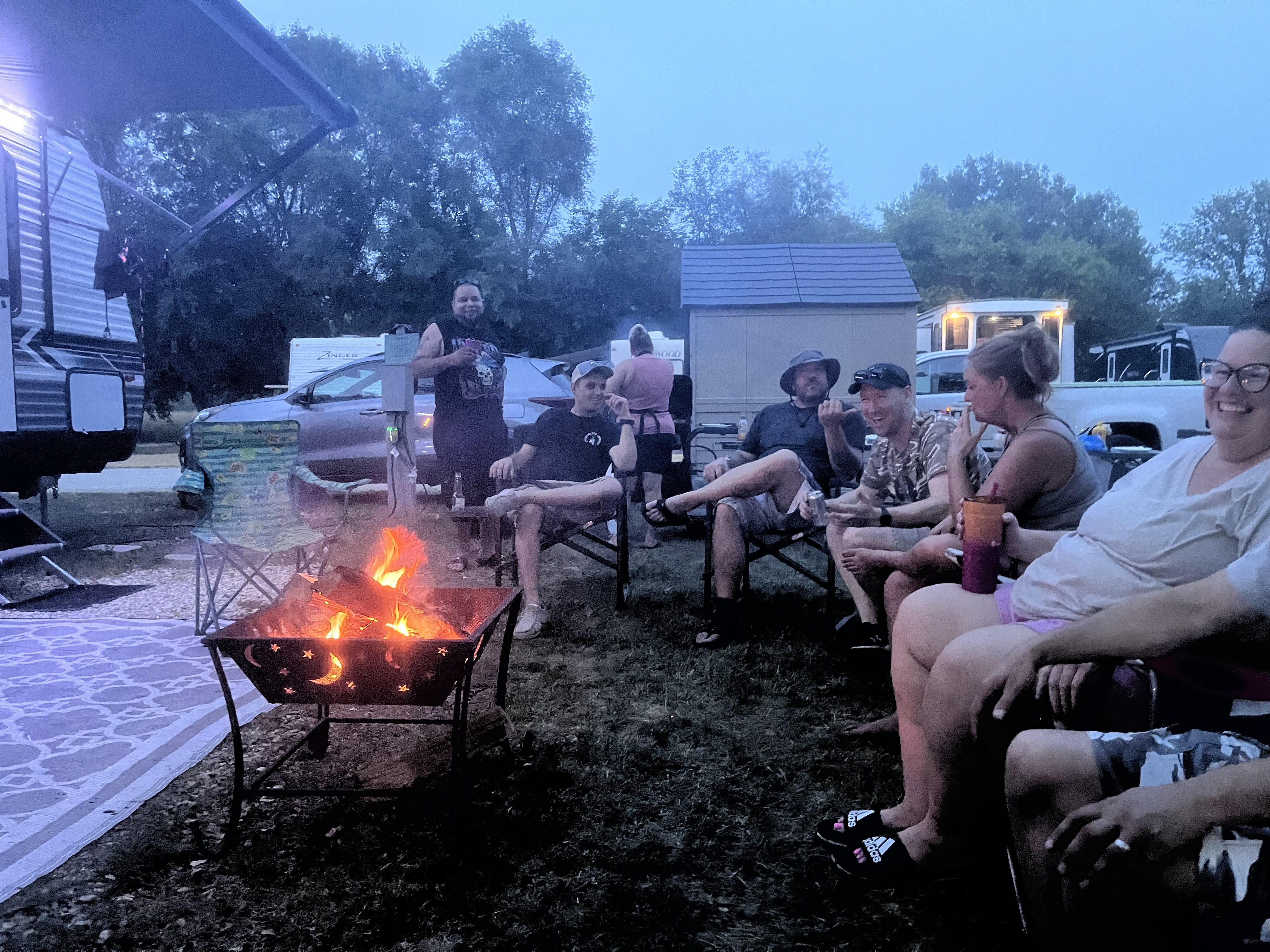 Deer Creek Recreation Club members gathered together at an RV campsite — community and member participation
